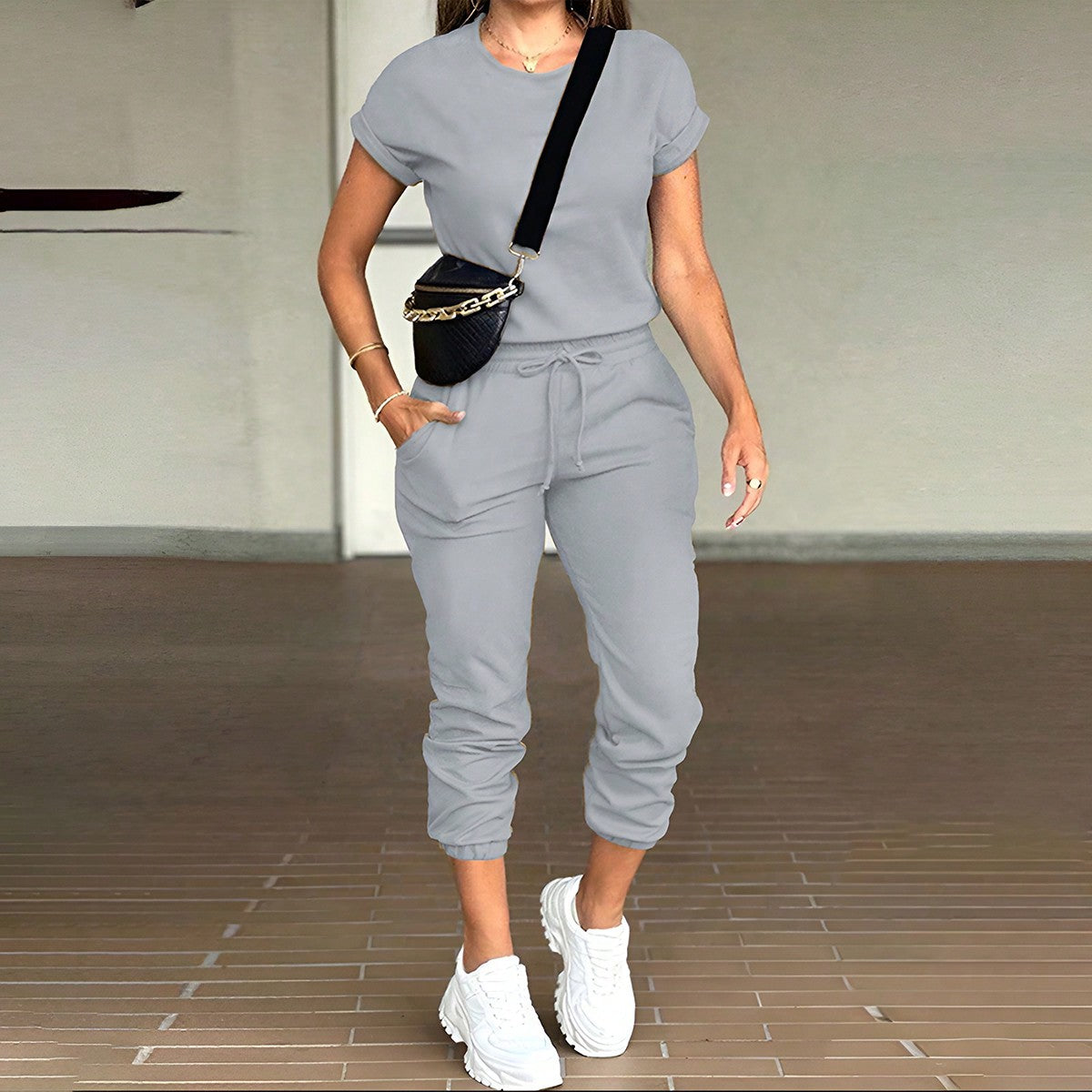 Fashionable casual solid-color round-neck top with pocket pants children's set