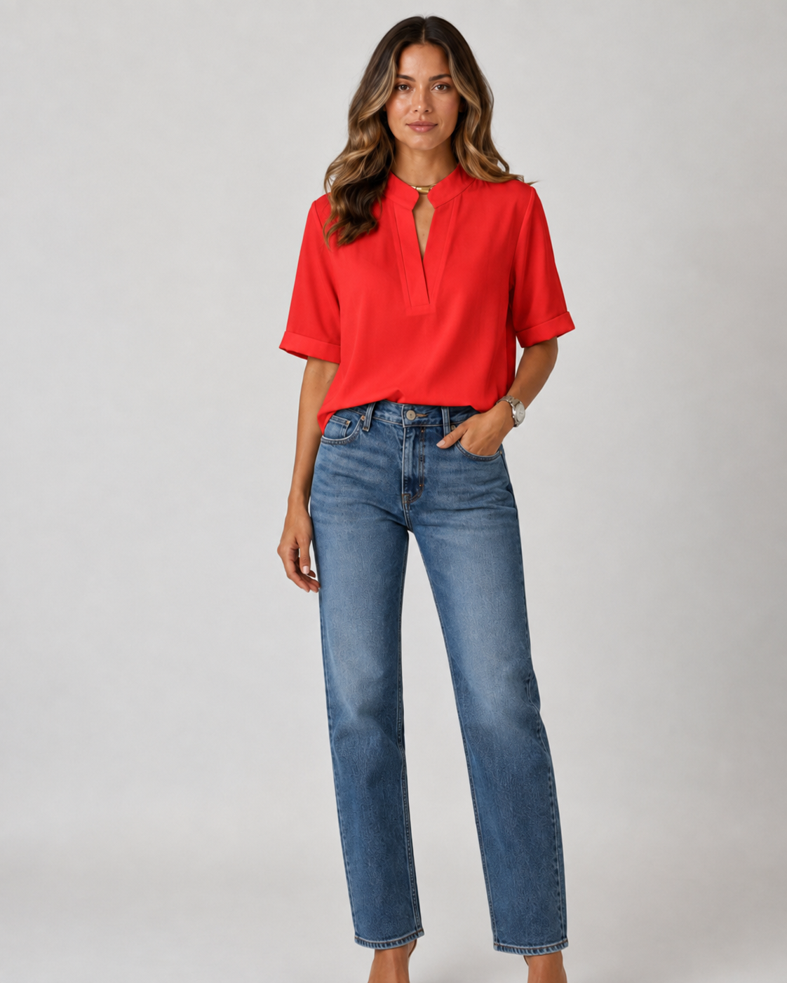 Elegant blouse with V‑neck and gold‑toned details