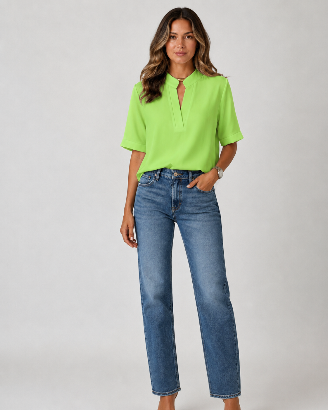 Elegant blouse with V‑neck and gold‑toned details