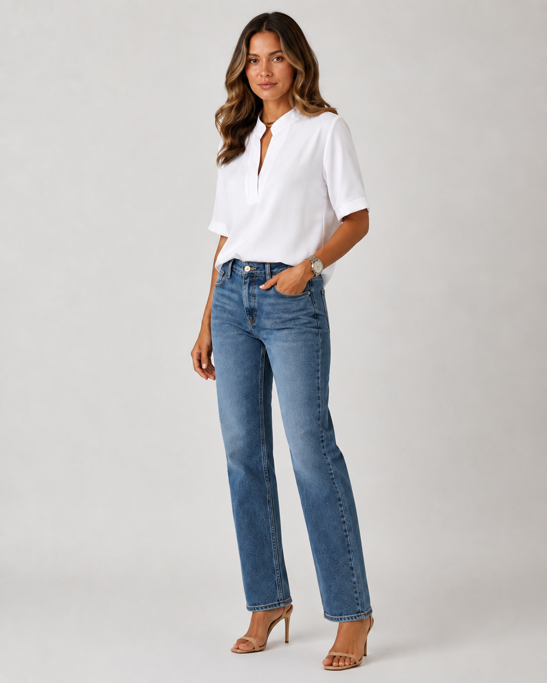 Elegant blouse with V‑neck and gold‑toned details