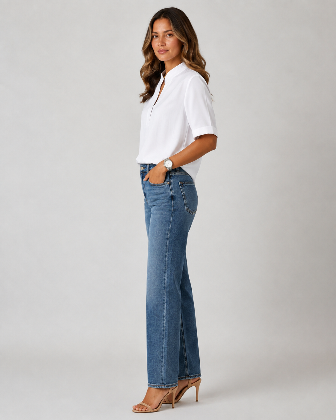Elegant blouse with V‑neck and gold‑toned details